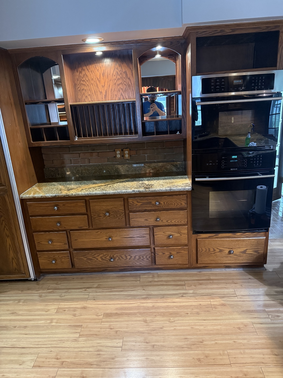 Clean kitchen cabinets and appliances
